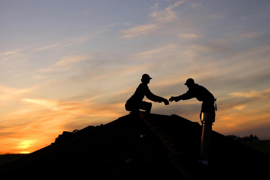 two man on the roof